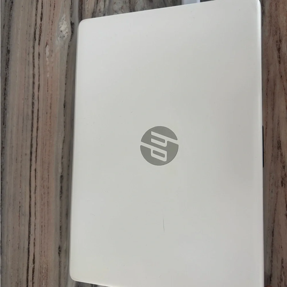 HP White Laptop with Silver Logo
